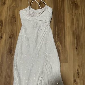 White sequins dress with legs slit